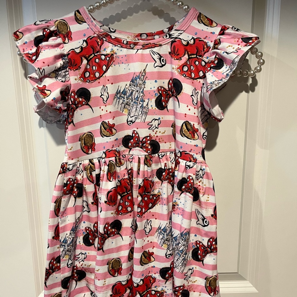 Disneys castle and Minnie Mouse ear dress